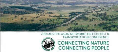 panorama of a landscape with a road in the middle and the text underneath '2018 Australasian network for ecology and transportation conference, connecting nature, connecting people'