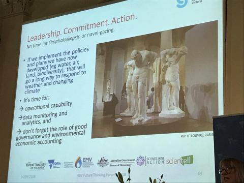 a presentation slide on leadership, commitment and action
